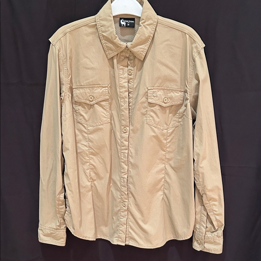 C - Tan Button-Up Shirt